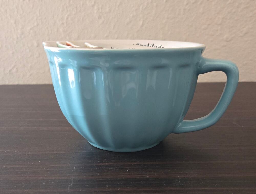 Set of 4 porcelain measuring cups